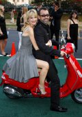 That skirt's so short you can nearly see her Vespa! 65