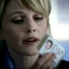Is this your card?  No, wait.  That's your ID.  How did that get in there? Cold_Case_S02E16_lilly_023