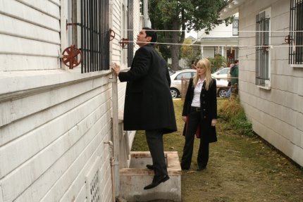 Quick Scotty, someone will see us - You really left your phone in there when speaking to a suspect and breaking in is the only way to get it back? - The boss will kill me if I lose another phone! s04e08_still_002.jpg